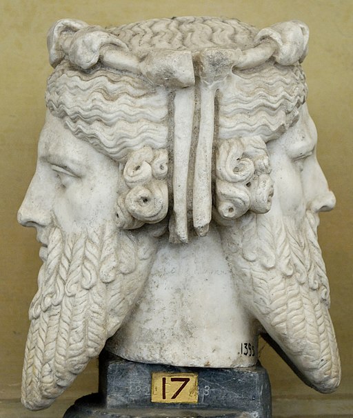 statue of two-faced Janus, Roman god, with one face looking forward, the other backwards