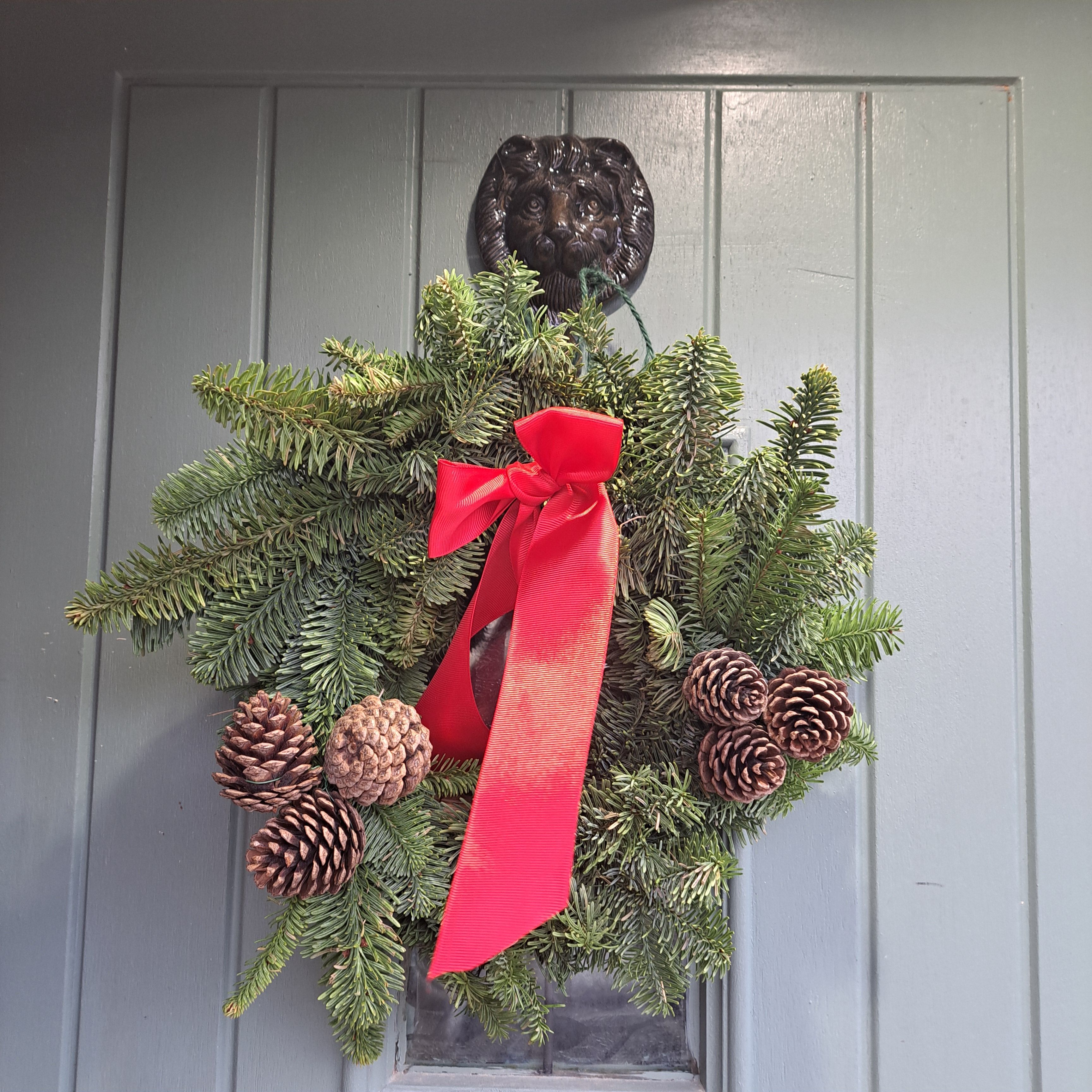 photo of a green wreath on my front door
