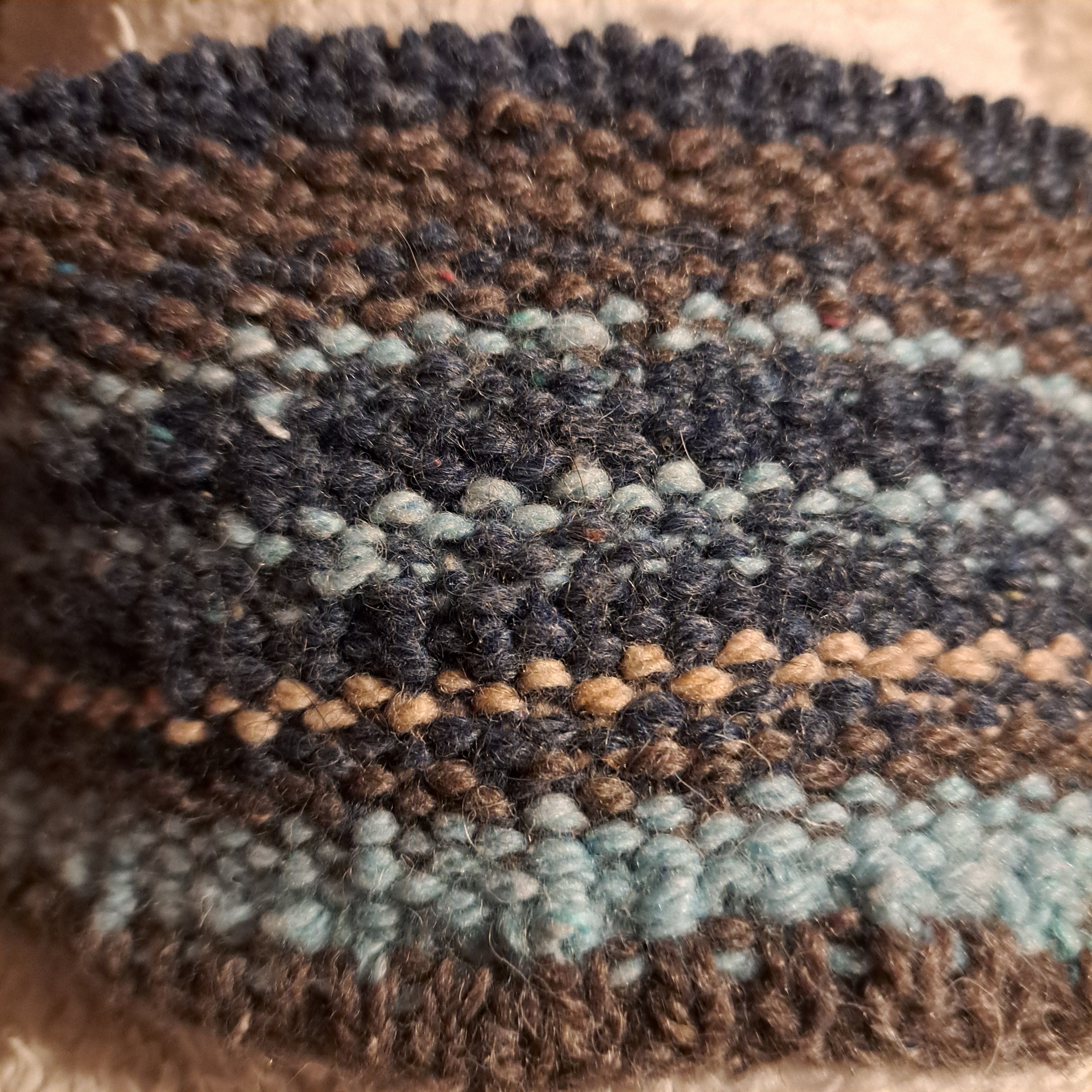 section of knitted temperature blanket